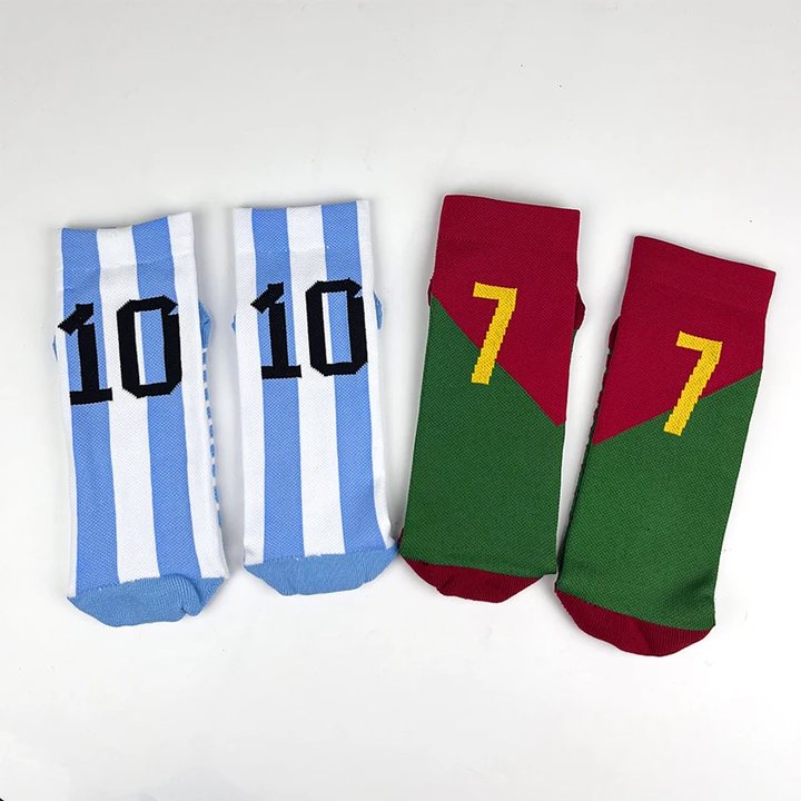 Two pairs of numbered short football socks, striped and two-tone