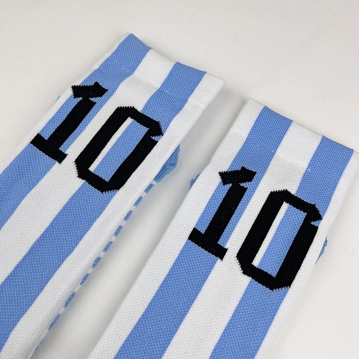 Close-up of the knitted number on a pair of striped football socks
